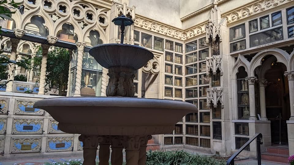 Ornate fountain in a historic courtyard of Chapel of the Chimes.