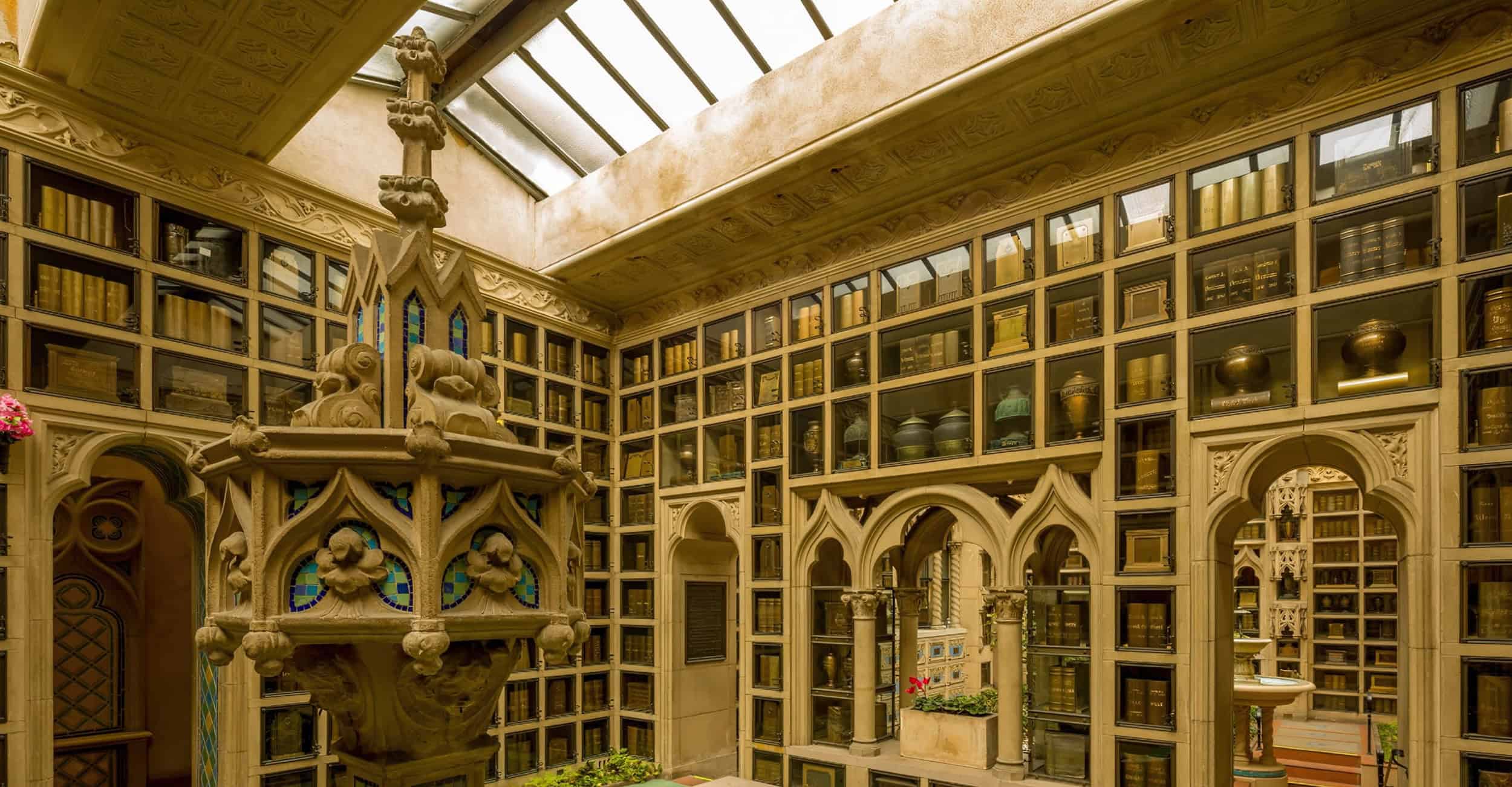 Interior view of the Chapel of the Chimes with shelves of urns and decorative architecture.