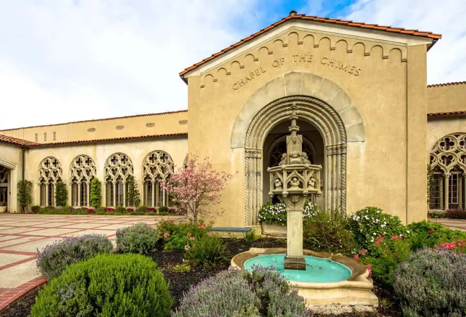 Front view of Chapel of the Chimes with fountain and garden.